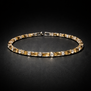 Gold emerald-cut crystal tennis bracelet in champagne color