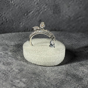 Silver stainless steel adjustable snake wrap zircon ring with dangling pear charm for women Aura Collection