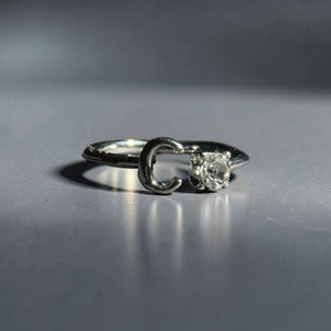 Silver stainless steel adjustable alphabet letter zircon designer ring for women Aura Collection