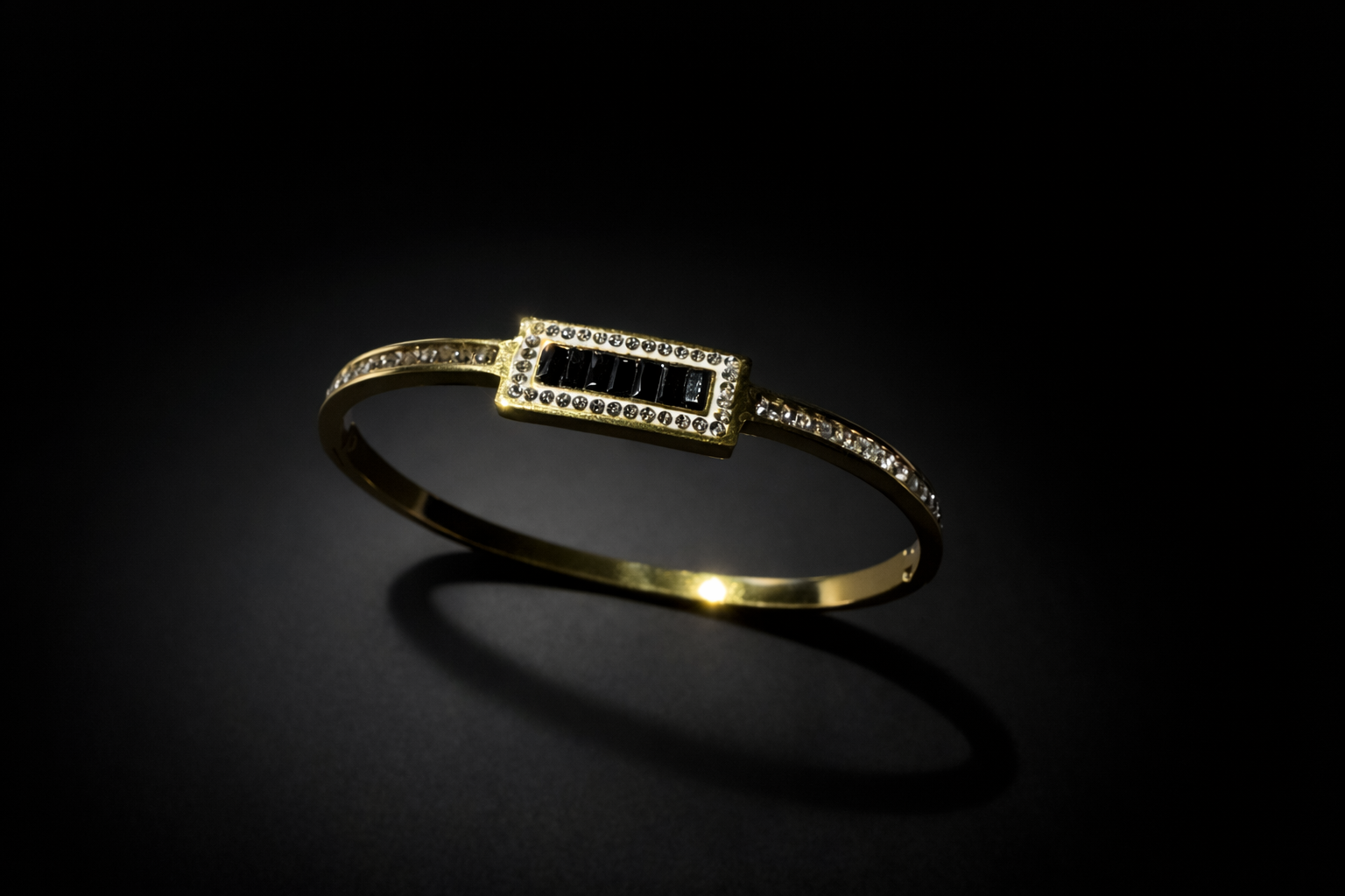 Gold rectangle crystal bangle with black stone for women designer structured jewellery