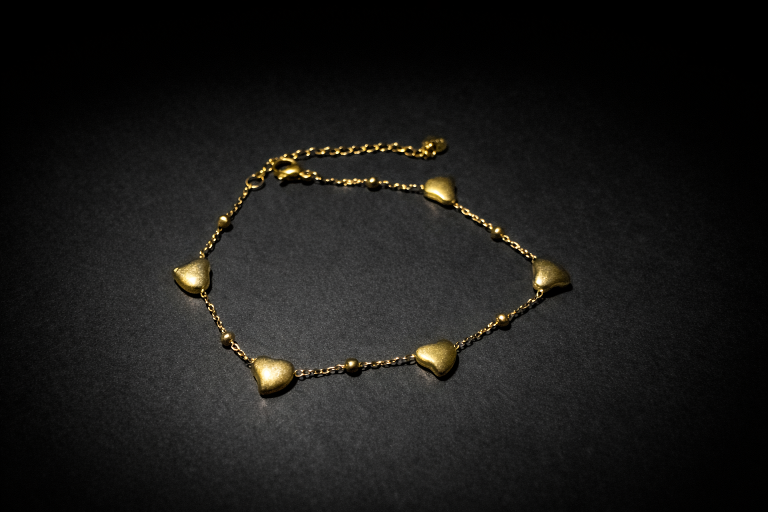 Minimal gold chain bracelet with multiple heart charms women jewellery