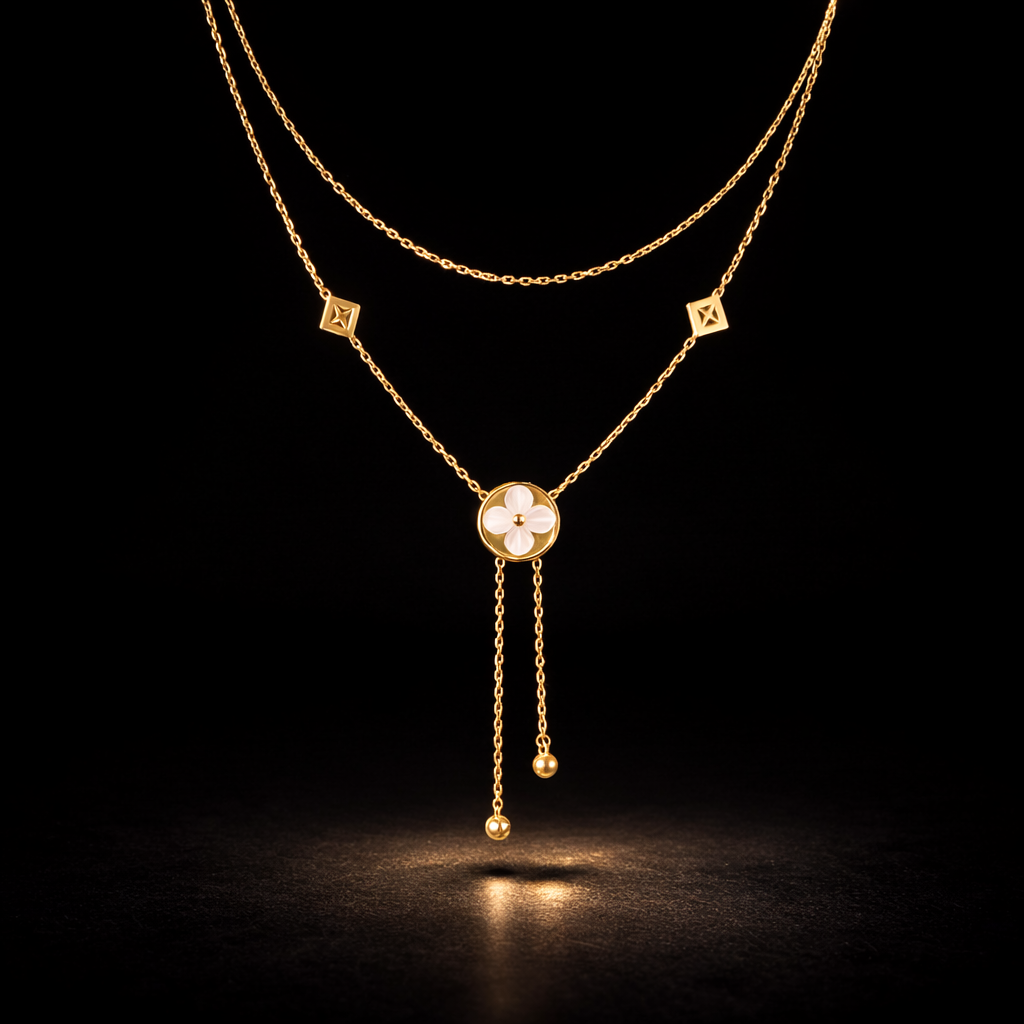 Gold layered necklace with floral pendant and dangling chain details