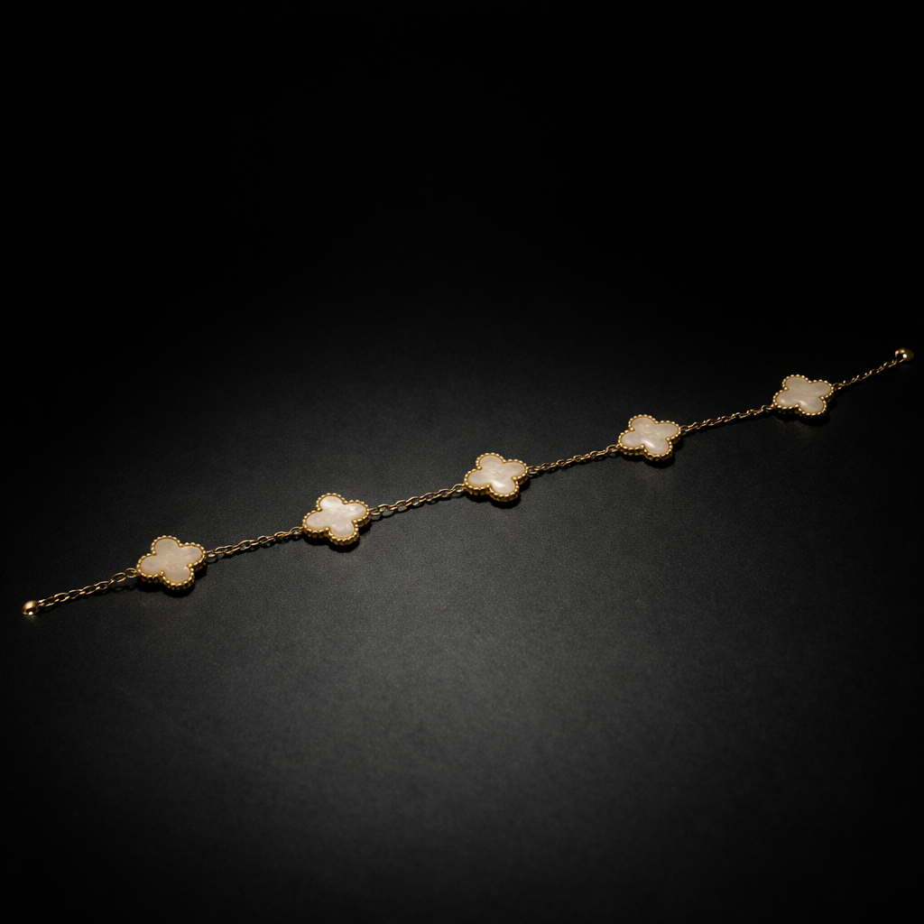 Gold clover station bracelet with white mother of pearl style charms