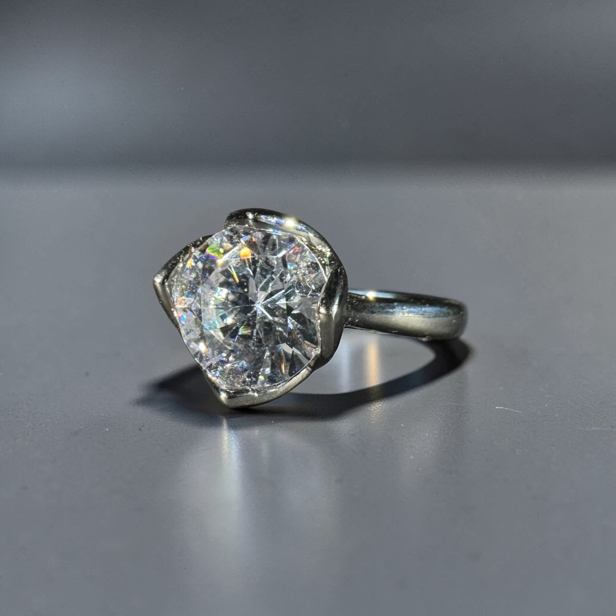 Silver stainless steel adjustable round zircon solitaire statement ring for women Aura Collection