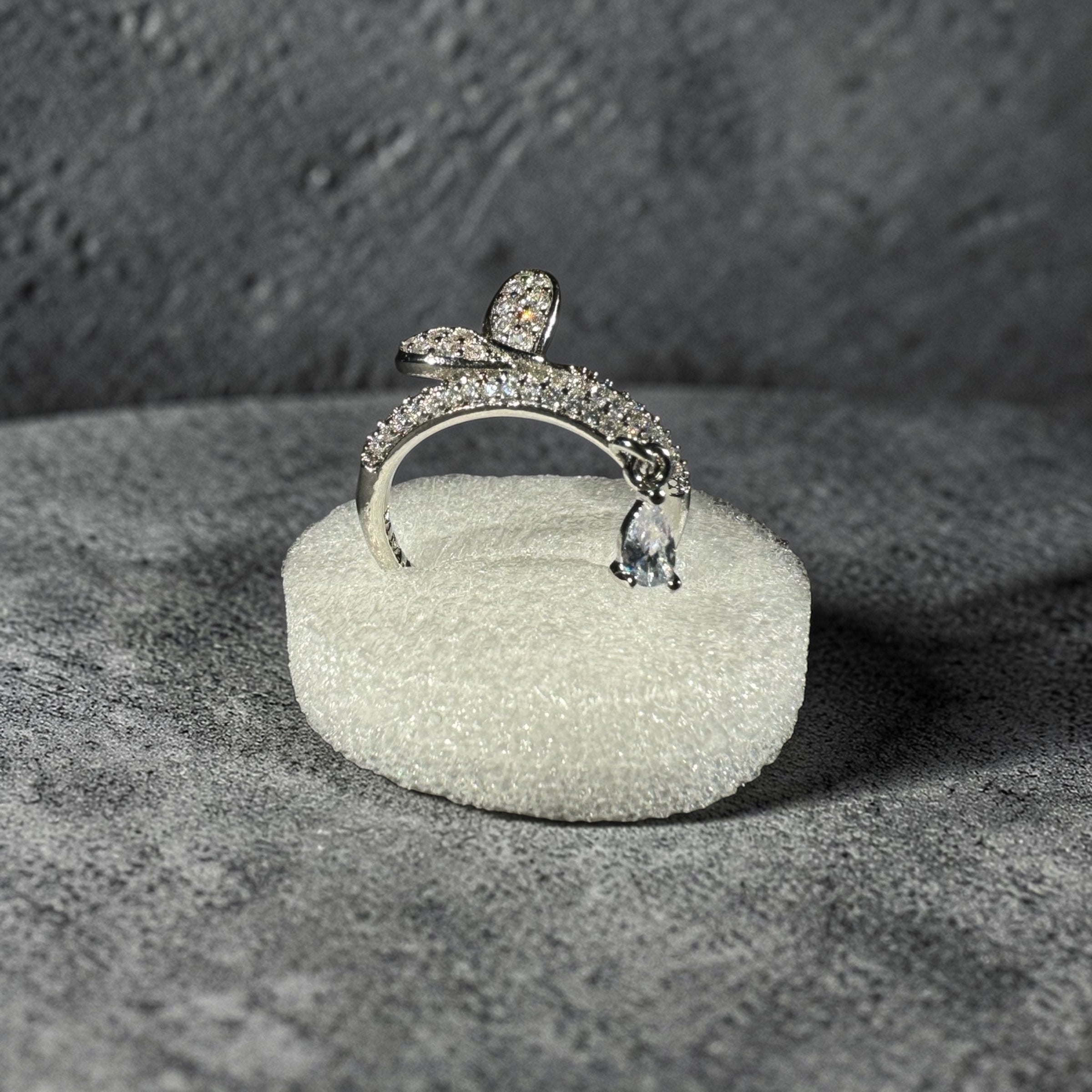 Silver stainless steel adjustable snake wrap zircon ring with dangling pear charm for women Aura Collection