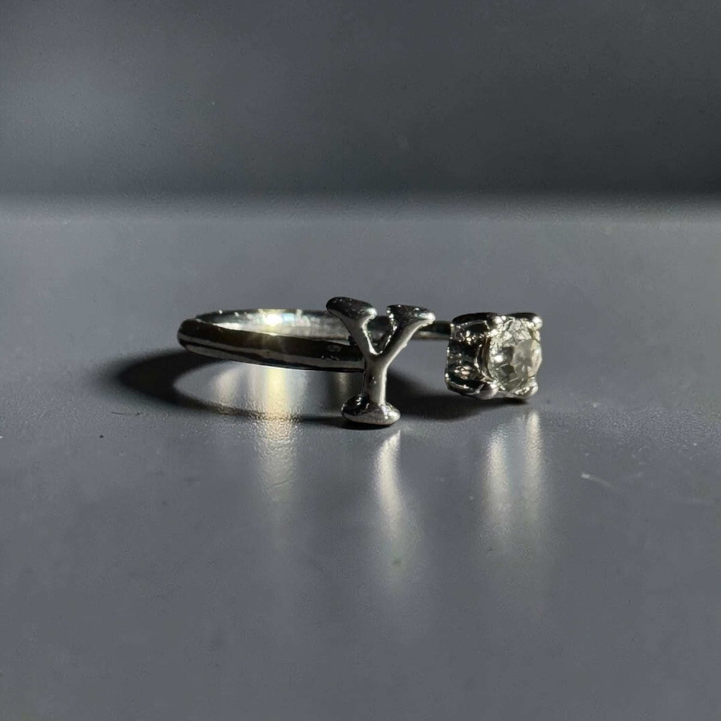 Silver stainless steel adjustable alphabet letter zircon designer ring for women Aura Collection