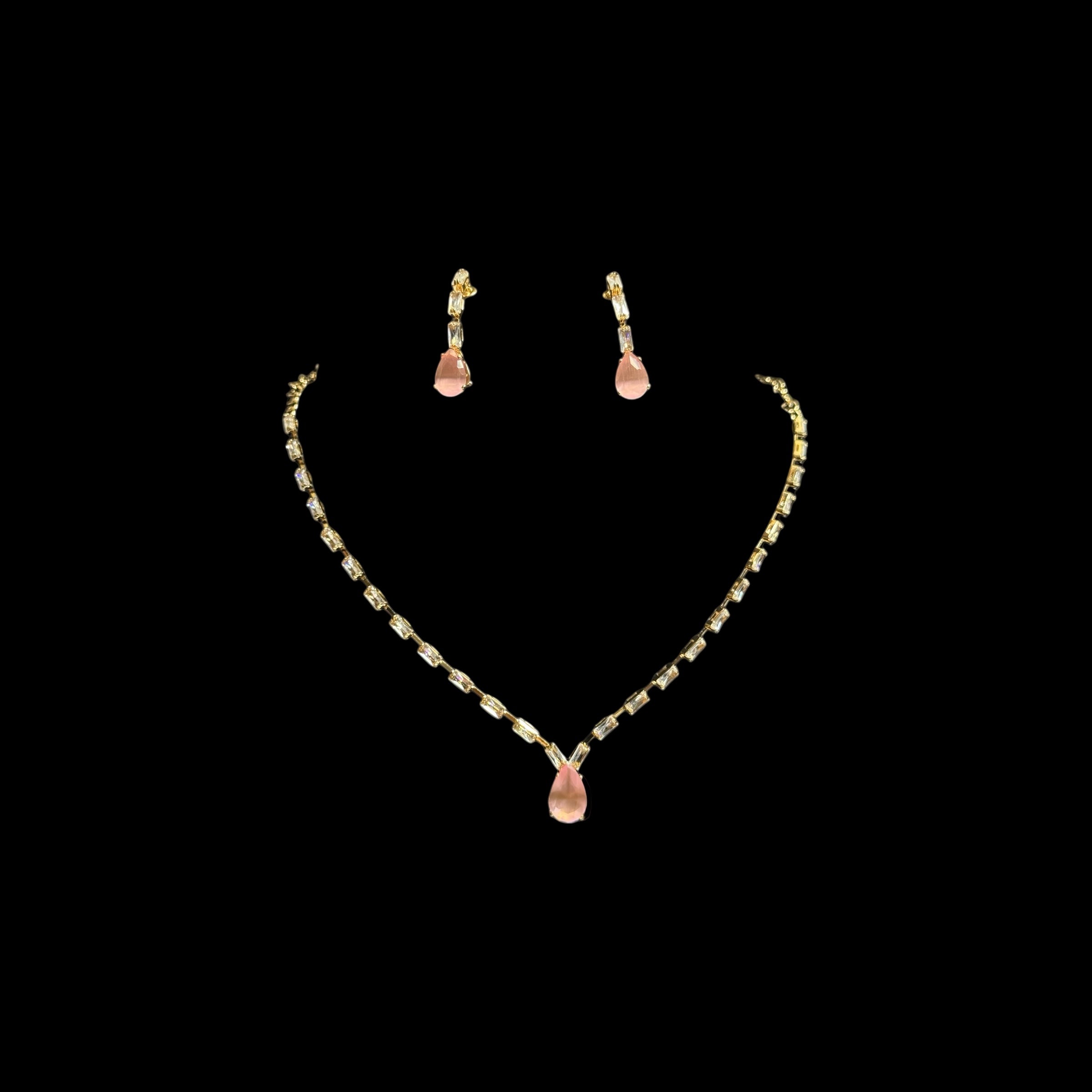 Gold crystal necklace and earrings set with pink teardrop pendant