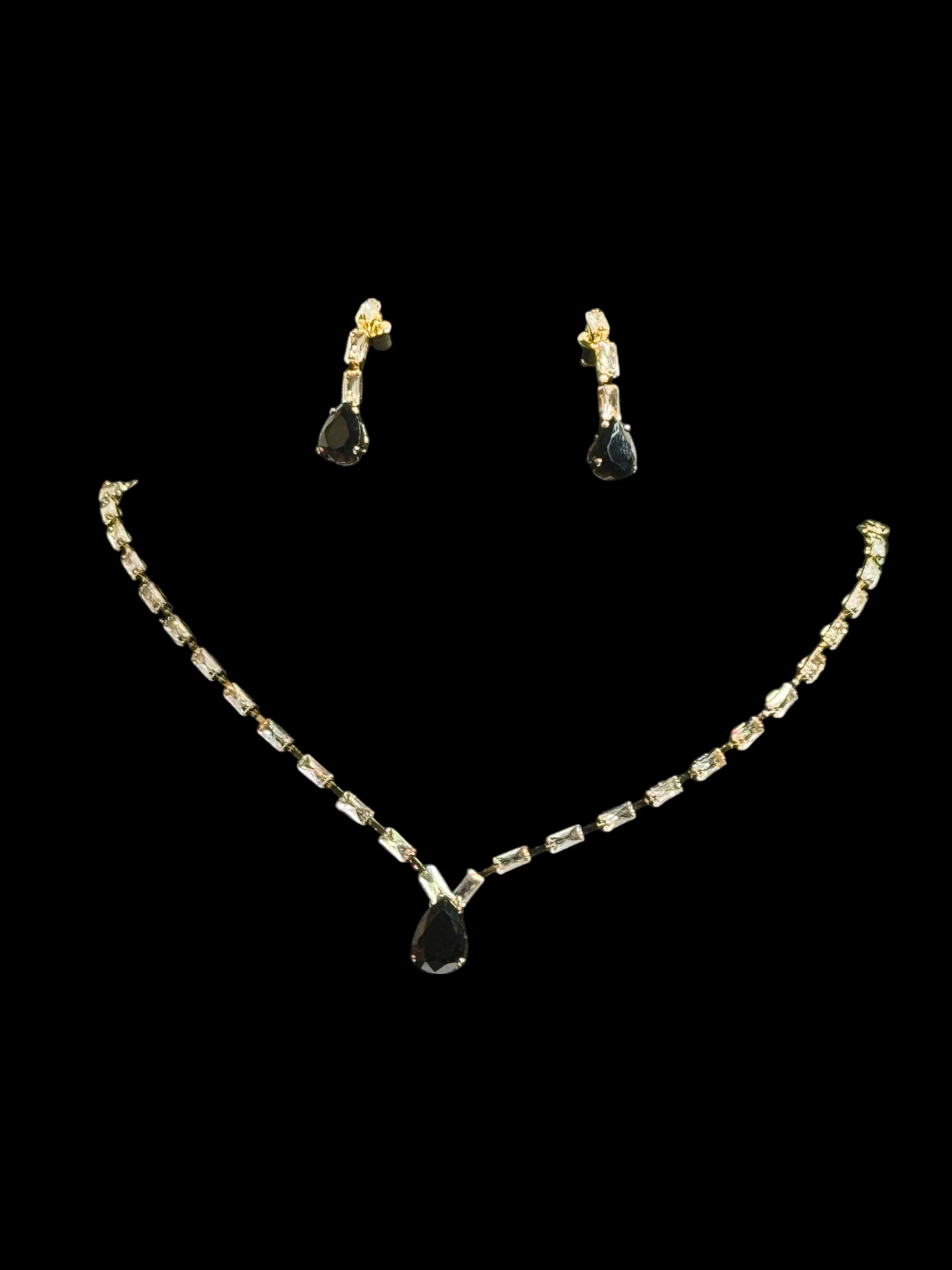 Gold crystal necklace and earrings set with black teardrop pendant