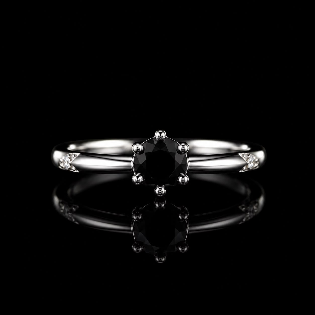 Aura Midnight Sovereign Ring featuring a brilliant black crystal solitaire set in a polished silver-tone band with sparkling accent stones.